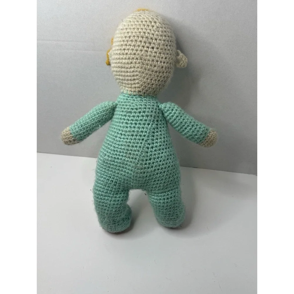 crochet doll of JJ from the children's‎ cartoon Cocomelon.